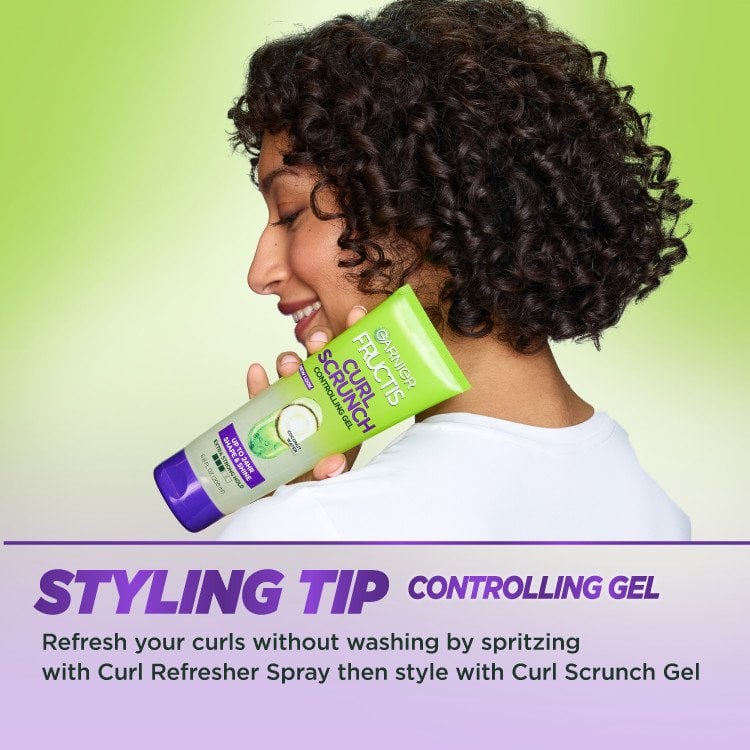 Styling tip: woman holding Curl Scrunch Gel.